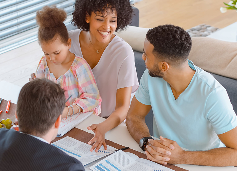 Young Family meeting with a financial advisor